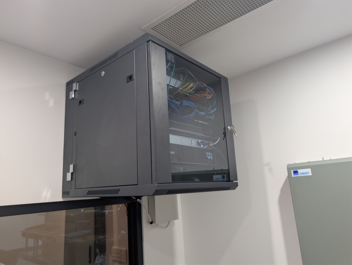 Network cabinet and communications mount installation