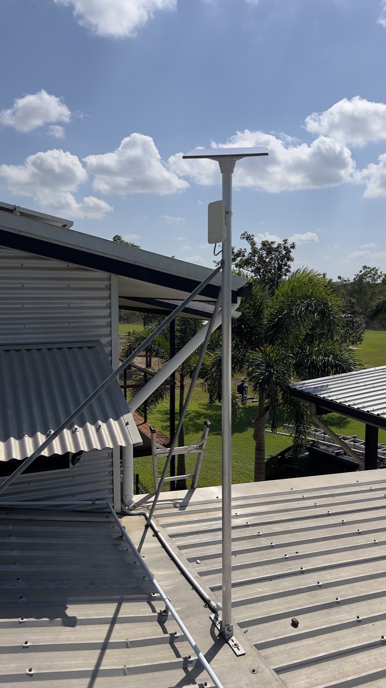 Roof-mounted Starlink dish installation with cable routing